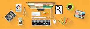 Digital Content Page Header. Overhead image of desk with computer and other items