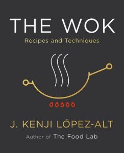 The cover of The Wok has a black background with the title in white type. There is a stylized drawing of a wok.