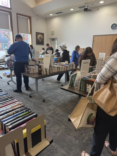People looking at books in a booksale