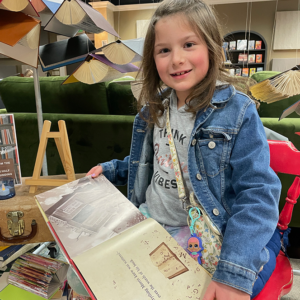 Girl sitting with book