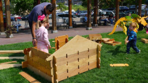 girl playing with builder boards